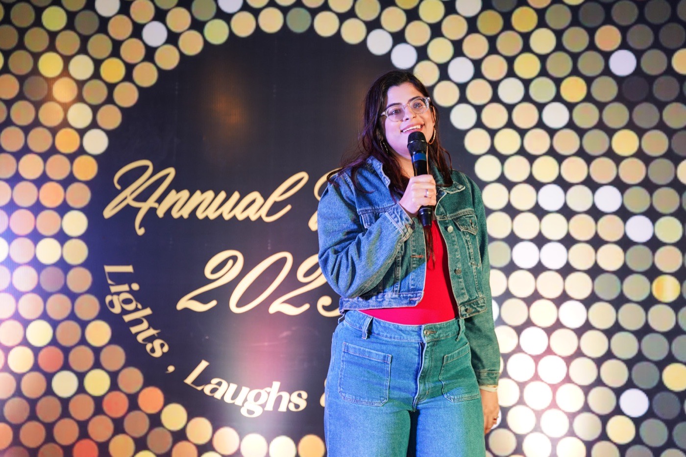 Mehak on stage under the spotlight